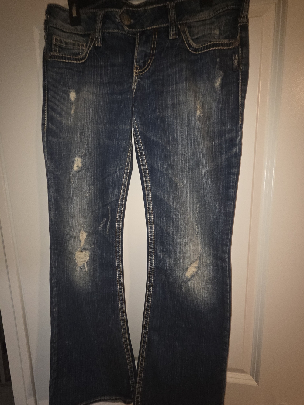Silver Jeans Distressed Dark Blue Flare Jeans